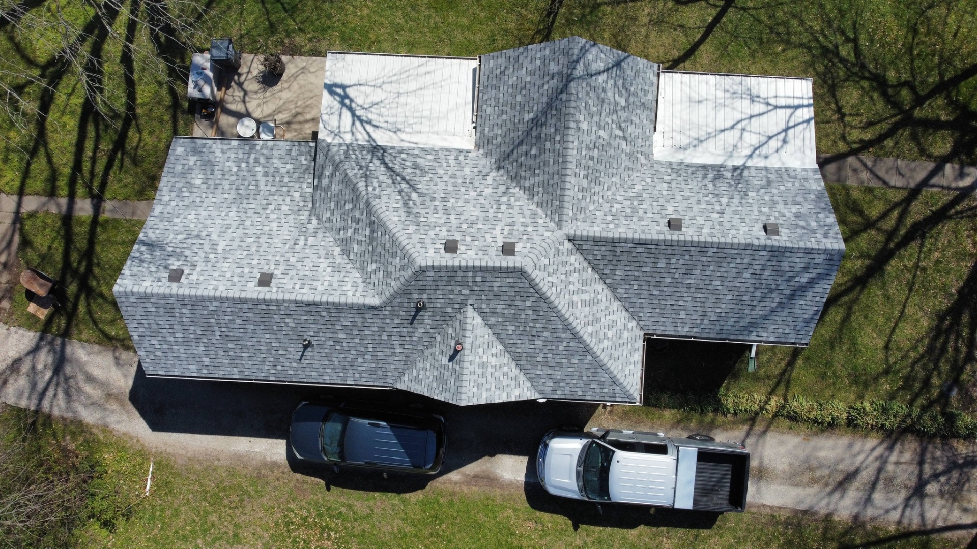 Completed residential shingle roof — aerial